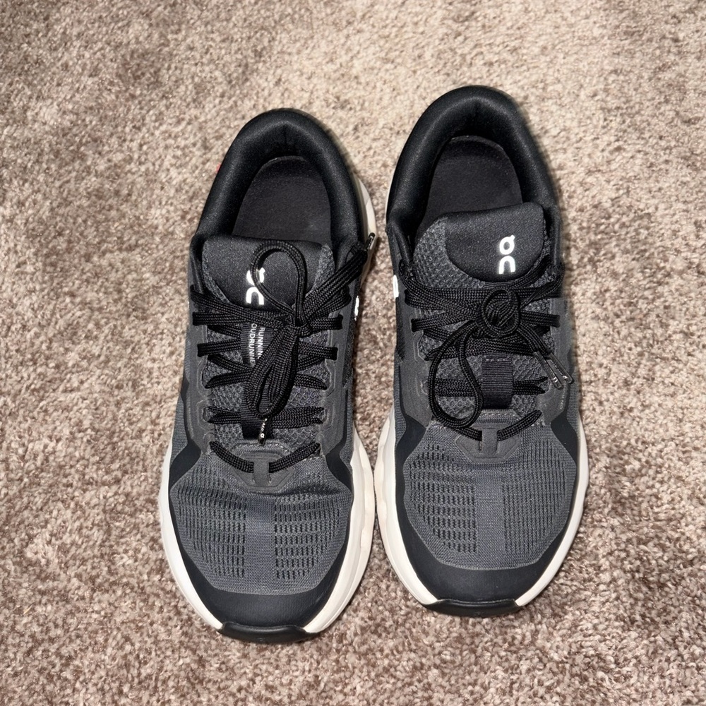 On Running Charcoal and White Athletic Shoes
